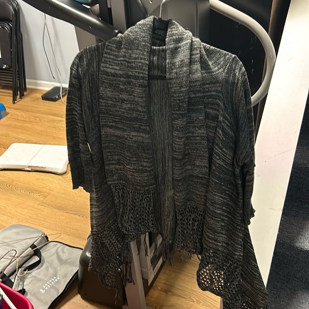 Black open sweater.   Great for dressy or casual